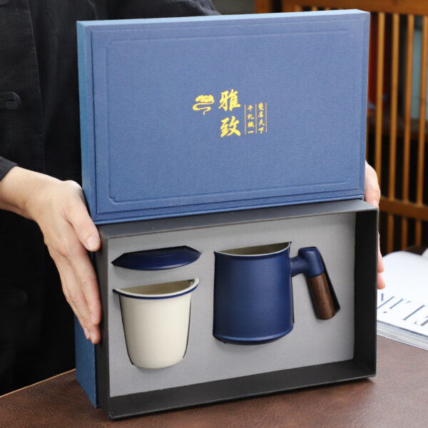 Dehua ceramic mug tea separation tea cup